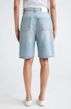 A low-rise waist and longline silhouette define nonstretch denim shorts crafted from organic cotton with a logo-embossed back patch. 8 1/2" inseam; 22" leg opening; 15" front rise; 16 1/2" back rise (size 29) Zip fly with button closure Front slant pockets; back patch pockets 100% organic cotton Machine wash, dry flat Made in Italy Designer Clothing This brand has B Corp certification, representing business practices with emphasis on social and environmental performance, accountability and trans Denim Knee-length Shorts With Belt Loops, Washed Blue Jean Shorts, Washed Blue Shorts With Five Pockets, Relaxed Fit Shorts With Five Pockets, Medium Wash Shorts With Five Pockets, Relaxed Fit Rigid Denim Jeans In Short Length, Denim Five-pocket Shorts, Denim Shorts With Five Pockets, Short Length Rigid Denim Jeans With Five Pockets