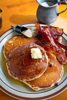 pancakes with bacon and butter on a plate