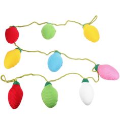 multicolored christmas lights hanging from string on white background