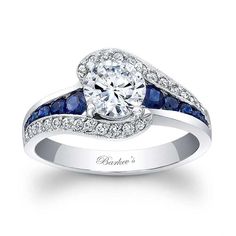 a diamond and blue sapphire engagement ring