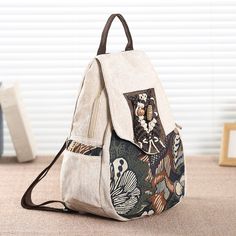 Fabric: cotton and linen blended thick canvas Back: shoulders, one shoulder, backStructure: The main bag has a zippered open pocket with a mobile phone pocket, a document pocket, and a mezzanine zip pocket.Size: height 33cm width 25cm thickness 12cm Beige Cotton Backpack Shoulder Bag, Cotton Beige Backpack Style Shoulder Bag, Beige Cotton Backpack Style Shoulder Bag, Beige Cotton Backpack, Fabric Shoulder Bag With Pockets For Travel, Cotton Canvas Backpack With Pockets, Fabric Shoulder Bag With Zipper Pocket For Travel, Cotton Backpack Shoulder Bag, Cotton Shoulder Bag Backpack With Pockets