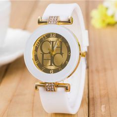 Geneva is a casual women's quartz wristwatch with crystals and a silicone strap. SPECIFICATIONS:Brand Name: GENEVAModel Number: CHHCStyle: CasualMovement: QuartzCase Material: Alloy, Stainless SteelCase Diameter: 40mmCase Shape: RoundBand Length (include Case): 240mm Band Material: SiliconeBand Width: 17mmClasp Type: BuckleWeight: 50g Note: The color may be slightly different because of the difference in how the display shows colors. Casual Watches Women, Womens Designer Watches, Geneva Watch, Dress Watches, Watches Women Leather, Design Theory, Simple Leather, Watch Women, Mode Casual