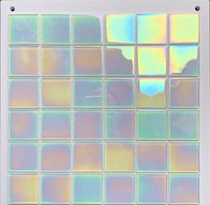 an image of a square tile pattern in pastel colors