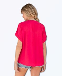 An unbelievably soft and silky hand feel elevates this classic short sleeve top. Featuring a cuffed sleeve, a flattering v-neckline, and a flowy, relaxed fit. Try it loose over jeans for a cool and casual vibe, or tuck it into trousers for a polished look. Silky crepe Relaxed fit V-neckline Short cuffed sleeve Banded collar Split neckline Bohemian top Model is 5'9, wearing a size S. 62% Acetate, 38% Viscose Casual V-neck Blouse With Rolled Sleeves, Casual V-neck Top For Spring, Solid Color Relaxed Fit Short Sleeve V-neck Top, Relaxed Fit Solid Color V-neck Short Sleeve Top, Solid Color Short Sleeve V-neck Top For Spring, Solid Color Relaxed Fit V-neck Short Sleeve Top, Trendy Short Sleeve V-neck Top For Summer, Spring V-neck Top With Short Sleeves, Solid Color V-neck Short Sleeve Top With Relaxed Fit