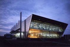 a large building with many windows at night