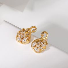 Luxury Teardrop Earrings Gift, Luxury Teardrop Earrings For Gift, Elegant Leaf-shaped Earrings, Elegant Leaf-shaped Earrings For Formal Occasions, Elegant Leaf-shaped Formal Earrings, Elegant Leaf-shaped Jewelry With Matching Earrings, Elegant Wing-shaped Cubic Zirconia Jewelry, Wing-shaped Pierced Earrings For Gift, Wing-shaped Earrings For Gift