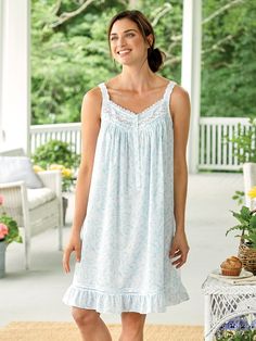 Talk about beautiful detailing. The rolling waves of Eileen West's aqua scroll print are echoed in the intricate lacework of the satin-lined shoulder straps and the inset just below the neckline. Flower-shaped buttons adorn the front placket. And while its length is short, this soft, cotton lawn gown's fit is generous. This item runs large; please order accordingly to ensure the best fit. Sleeveless chemise keeps you sleeping comfortably Graceful silhouette with all-around release pleats Detailed with lace trim, flower-shaped buttons, horizontal pintucks, open hemstitching, and a ruffled hem Approx. 36" long 100% cotton lawn Machine wash and dry Imported Exclusive to The Vermont Country Store Coordinating Eileen West Aqua Scroll Short Robe (#78610), sold separately | Eileen West Aqua Scrol Beach Wrap Skirt, Vermont Country Store, Eileen West, Cotton Nightgown, Country Store, Spaghetti Strap Dress, Blue Outfit, Strap Dress, Spaghetti Strap Dresses