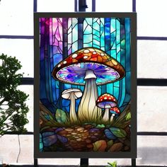 a stained glass window with mushrooms in it