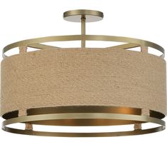 a light fixture with a beige fabric shade