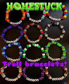 several bracelets with beads on them and the words, hoestuck troll bracelets