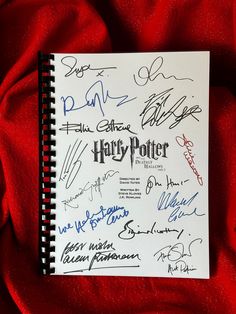 a harry potter book with autographs on it