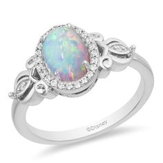 PRICES MAY VARY. Officially Licensed Disney Jewelry - Enchanted Disney Fine Jewelry Cinderella Ring in Sterling Silver with 8X6 MM Created Opal and 1/10 Cttw Natural White Round Diamond Dimension - L: 22.8 mm, W: 7.7 mm, H: 26.6 mm Inspiration – Create your own fairy tale with romantic jewelry inspired by Disney's Cinderella. Iconic jewelry designs of the pumpkin carriage and glass slipper in shining gold, sparkling diamonds, and beautiful blue topaz make you believe that dreams do come true Wor Cinderella Engagement Rings, Cinderella Ring, Disney Png, Enchanted Disney, Enchanted Jewelry, Enchanted Disney Fine Jewelry, Cinderella Wedding, Princess Jewelry, Opal Wedding Rings