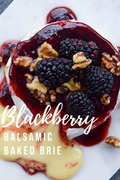 blackberry balsamic baked brie on a white plate