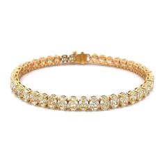 This exquisite 18k yellow gold tennis bracelet feature 23.78 carats of fancy yellow diamonds for a deluxe and luxurious look. Its classic oval cut and design add elegance and sophistication to any wardrobe. DIAMOND 23.78 OV TCW 42 PCS. FANCY YELLOW VS118K YG 17.59 GRAMS SIZE 7" B-11648 Gold Oval Tennis Bracelet For Wedding, Luxury Gold Oval Tennis Bracelet, Elegant Yellow Diamond Bracelet For Formal Occasions, Yellow Gold Oval Cubic Zirconia Tennis Bracelet, Luxury Gold Oval Diamond Bracelet, Gold Oval Diamond Bracelet With Brilliant Cut, Gold Diamond Bracelet With Brilliant Cut In Oval Shape, Yellow Diamond Bracelet, Gold Tennis Bracelet