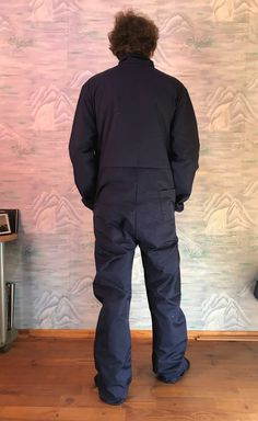 "Men's Work Overall Workers Coveralls Navy Workers Salopette Industrial Clothing Navy Jumpsuit Work Romper Mechanic Work Wear Large Size Label size: 116 Estimated size: L Measurements (lying flat): Shoulders: 20,5\"/ 52 cm Length: 64,5\" / 164 cm Sleeve: 27.5\" / 70 cm Pit to pit: 24.5\" / 62 cm Waist: 29.5\" / 75 cm Pant leg inseam: 32\" / 81 cm Condition: excellent condition Please check measurements to insure a proper fit. Remember to allow yourself some extra room for movement. You can compa Utility Workwear Shortalls With Pockets, Utility Style Workwear Shortalls With Pockets, Utility Shortalls With Pockets For Workwear, Utility Style Bib Front Jumpsuits And Rompers For Work, Utility Bib Front Jumpsuits And Rompers For Workwear, Workwear Overalls With Bib Front And Pockets, Workwear Shortalls With Pockets, Workwear Shortalls Overalls With Pockets, Bib Front Overalls With Pockets For Workwear