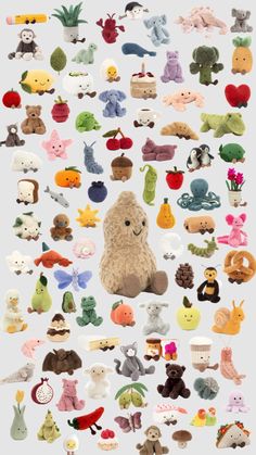 an assortment of stuffed animals are arranged in rows