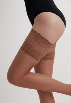 20 denier Flame fashion stockings by Conte Elegant is outstanding stockings with the most beautiful lace top, which, like a border, separates elastic yarn and delicate skin. They call more to the open part of the thigh than simply hide the body. They create a contrast of fabric and skin in appearance and feeling.Flame stockings by Conte Elegant are made of multi-filament Lycra yarn, which provides high elasticity, durability and softness. These stockings are well kept on the legs due to the wide Beige Sheer Thigh-high Stockings, Beige Stretch Over-the-knee Stockings, Beige Sheer Thigh High Legwear, Elegant Beige Micro-elastic Hosiery, Thigh High Lace Hosiery With Lace Trim, Elegant Thigh High Beige Hosiery, Elegant Beige Thigh-high Hosiery, Elegant Beige Thigh High Hosiery, Elegant Fitted Beige Stockings