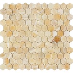 a white and beige mosaic tile pattern with hexagonal tiles on the bottom half