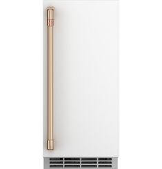 a white refrigerator freezer sitting on top of a metal shelf with a gold handle