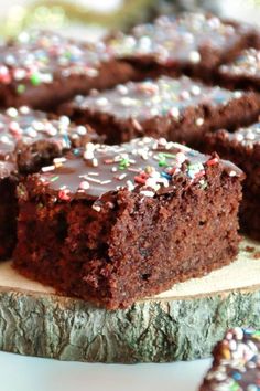 chocolate cake with sprinkles on a cutting board