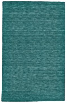 a green rug with an uneven design on the front and back side, in shades of teal