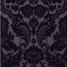 a black and white wallpaper with an ornate design on it's side,