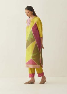 Editor's Note This kurta and pant set is a vibrant and stylish choice for any occasion. The kurta features a multicolour abstract grid and floral stripe pattern, adding a modern and artistic touch to the outfit. The design is a unique combination of geometric and floral elements, creating a bold and eye-catching print. Color: Multicolor Fabric: Natural silk Components: Kurta and pant Fit: Relaxed Occasion: Festive Care: Dry Clean Only About the Designer Shivani Bhargava defines itself in three w Easy Clothing, Blouse Yoke, Kurta With Pants, Natural Silk, Floral Stripe, Pant Set, Set For Women, Festival Wear, Stripe Print