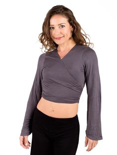 This classic wrap shrug can be worn over tank, as a light layer, or on its own. [#details] One Size (O/S) [/details] [#fabric] Lightweight Rayon Lycra: 90% Rayon (Viscose) / 10% Spandex (Lycra) [/fabric] Fitted Solid Color Wrap Top, Fitted Wrap Shrug For Layering, Fitted Long Sleeve Faux Wrap Top, Fitted Wrap Shrug For Fall, Fitted Faux Wrap Top For Spring, Fitted Versatile Wrap Top For Spring, Versatile Fitted Wrap Top For Spring, Elegant Fitted Solid Color Wrap Top, Fitted Wrap Top For Fall