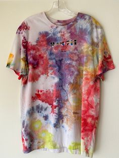 Super fun soft cotton hand dyed Nike graphic tie-dye t-shirt. This unique tee is a fun addition to your closet or to give us a gift. Fits an oversized Meduim or a standard Large. Multicolor Graffiti Print T-shirt For Summer, Summer Acid Wash T-shirt With Screen Print, Trendy Hand Dyed Crew Neck T-shirt, Tie Dye Cotton T-shirt For Streetwear, Multicolor Graffiti Print Cotton T-shirt, Casual Relaxed Fit Paint Splatter T-shirt, Fun Summer Festival T-shirt, Casual Crew Neck T-shirt With Paint Splatter, Hippie Multicolor T-shirt For Spring