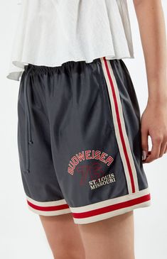 PacSun exclusive! Give your next look a sporty edge with the Budweiser By PacSun Basketball Shorts. These comfy high-waisted shorts are made from a lightweight fabric and feature a drawstring waistband, contrast striped trimming, Budweiser graphic at the hem, and a relaxed fit. 12" rise25" leg opening4" inseamHigh-riseDrawstring waistbandSide hand pocketsContrast striped trimmingBudweiser graphicLonger inseam Relaxed fit100% polyesterMachine washableModel is wearing a size smallModel measurements: 5’8.5” height, 32” bust, 23.5” waist, 35” hips Budweiser Womens By PacSun Basketball Shorts - Gray size Large Slim Fit Cargo Pants, Kids Activewear, Curve Jeans, Jeans Kids, Kids Swimwear, Basketball Shorts, Slim Fit Pants, Womens Activewear, Drawstring Waistband