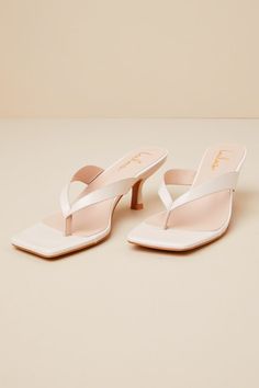 Keep it simple but make it chic with the Lulus Wistery Ecru Kitten Heel Thong Sandals! These flirty sandals have a smooth faux leather construction that shapes a toe thong upper atop a trendy square footbed. The slide-on design makes for easy styling, all atop a cute kitten heel. 1. 25" wrapped spool heel. Cushioned insole. Rubber sole has nonskid markings. Man made materials. Imported. Lulus | Wistery Ecru Kitten Heel Thong Sandal Heels | Size 6.5. High Heel Thong Sandals, Kitten Heel Sandals, Spool Heel, Sandal Heels, Size 11 Heels, Cute Kitten, Knitted Romper, Keep It Simple, Kitten Heel