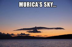 an image of the sky with clouds and mountains in the background that says murica's sky