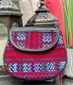 Beautiful and colorful One of a kind huipil crossbody bag made by Guatemalan artisan women.  Wear a bag that is unique as you are! very convenient to carry small items like cellphone, wallet, keys and more. *adjustable strap *2 extra  smaller pockets *Leather Visit shop to see other color options! Disclaimer: Due to the nature of the product imperfections are expected and appreciated. Traditional Handwoven Crossbody Shoulder Bag, Traditional Handwoven Crossbody Bag, Artisan Multicolor Shoulder Bag With Removable Pouch, Traditional Shoulder Bag With Phone Pocket For Everyday Use, Traditional Crossbody Shoulder Bag For Daily Use, Traditional Shoulder Bag With Cell Phone Pocket For Travel, Traditional Travel Shoulder Bag With Cell Phone Pocket, Traditional Multicolor Crossbody Shoulder Bag, Traditional Clutch Shoulder Bag For Travel