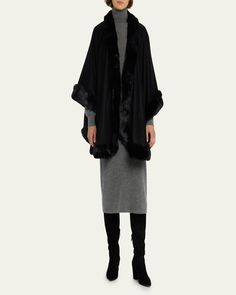 Sofia Cashmere cape in cashmere and faux fur (acrylic/polyester) trim     Open front     Cape sleeves     Hem rests below hips     Imported Fur Trimmed Cape, Faux Fur Cape, Fur Trim Coat, Cashmere Cape, Fur Cape, Cashmere Color, Cape Sleeves, Faux Fur Collar, Fur Collars