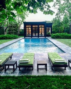 an outdoor pool with lounge chairs around it and the words steve gambrel above it