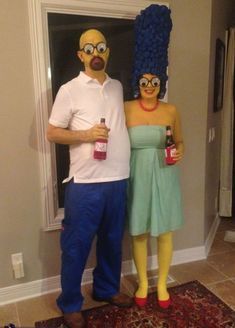 a man and woman dressed up as simpsons and homer