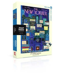 the new york puzzle box is shown in blue and white, with an image of a city at night