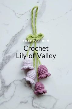 crochet lily of valley ornament on marble countertop with text overlay