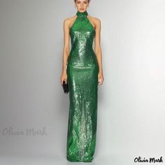 Olivia Mark - Sleek Green Halter Neck Sequin Sleeveless Backless Bodycon Long Party Dress Green Stretch Evening Dress For Party, Glamorous Sleeveless Holiday Evening Dress, Glamorous Green Evening Dress For Night Out, Sleeveless Evening Dress For Gala Holiday, Green Halter Neck Evening Dress For Gala, Sleeveless Bodycon Evening Dress, Bodycon Sleeveless Evening Dress, Stretch Sleeveless Sequined Evening Dress, Sleeveless Stretch Evening Dress For Party Season