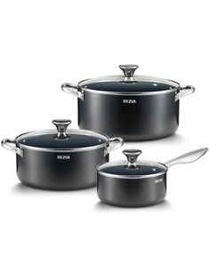 three pots and pans with lids on them