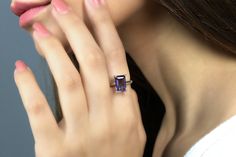 A look of luster and elegance, this solitaire ring flaunts an Amethyst stone. A simple yet classy adornment for a special event, this is perfect for a timeless look. A charming gift jewelry you can choose as a promise ring, anniversary present, or birthday treat for a February-born lady. ☛ 𝒜𝐵𝒞 - Add Engraving - https://etsy.me/3CLxYPZ ☛ Ring size - Select the size you would like from the drop down menu ♥ Gemstone Type - Amethyst (Lab Created) ♥ Gemstone Size - 7x11mm ♥ Gemstone Cut - Rectangl Modern Emerald-cut Amethyst Ring Gift, Modern Emerald Cut Amethyst Ring Gift, Formal Purple Rings With Rectangular Stone, Square Cut Amethyst Ring For Formal Occasions, Formal Square Cut Amethyst Ring, Classic Purple Square Cut Ring, Elegant Amethyst Ring With Rectangular Stone For Anniversary, Elegant Rectangular Amethyst Ring For Anniversary, Elegant Rectangular Solitaire Ring