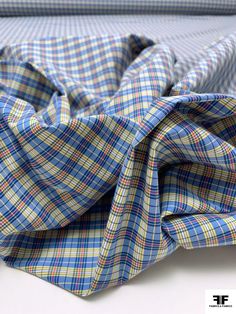 Content: Cotton / Spandex Color: Blue / Yellow / Red / White Width: 57 inches Blue Classic Stretch Shirt, Blue Yarn-dyed Cotton Shirt, Blue Yellow Red, Fashion District, Fabric Yardage, Fashion Fabric, White Plaid, Quality Fashion, Yarn Dyeing