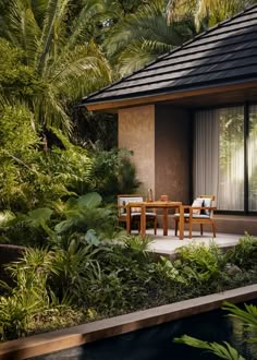 an outdoor dining area with table and chairs