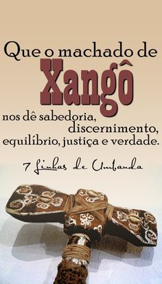 an image of a cross with the words xango written in spanish and english on it