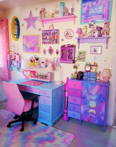 a room filled with lots of colorful furniture and decor on the walls, including a pink desk