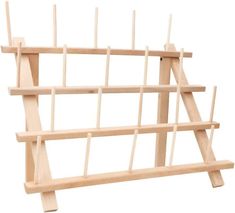 a wooden display rack with multiple pieces of wood sticking out of it's sides