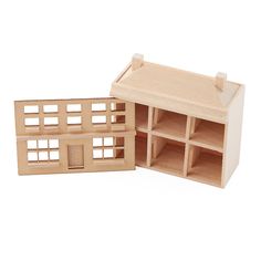 a small wooden doll house with its windows open