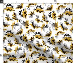 a yellow and black pattern on white fabric with an image of birds in the background