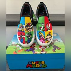 Step Into The World Of Super Mario Bros With These Slip-On Shoes! Perfect For Kids Who Love The Colorful Characters And Adventures Of Mario, These Shoes Come In Multiple Sizes For A Comfortable Fit. The Slip-On Design Makes Them Easy To Wear, While The Vibrant Multicolor Theme Adds A Fun Touch To Any Outfit. Featuring An Officially Licensed Super Mario Bros Design, These Shoes Are Perfect For Casual Wear And Are Suitable For Both Boys And Girls. The Unisex Aspect Ensures That They Can Be Enjoyed Colorful Characters, Children Shoes, All Kids, Shoes Brand, Super Mario Bros, Mario Bros, Disney Art, Super Mario, Heat Press