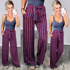 Women's Striped Tie Front Palazzo Pants in Burgundy Epiphany Moment Pants - Burgundy Rock these burgundy beauties from dawn to dusk! These striped Epiphany Moment Pants are comfy, lightweight, and versatile for any occasion. Details Available in sizes S-L Tie Front at Waist High Waisted Elastic at Back Pockets Light Weight Material for year round wear Sizing Small: 2/4, Medium: 6/8, Large: 10/12 Fit Fits True to Size at Waist and Loose at the Legs, Amanda is 5'3, 32DD, Size 3/5 and is wearing th Casual Burgundy High-waisted Pants, Spring High-waisted Burgundy Pants, Burgundy High-waisted Pants For Spring, Spring Burgundy High-waisted Pants, Burgundy Long Pants For Spring, Spring Burgundy Long Pants, Pocket Light, Striped Tie, Epiphany